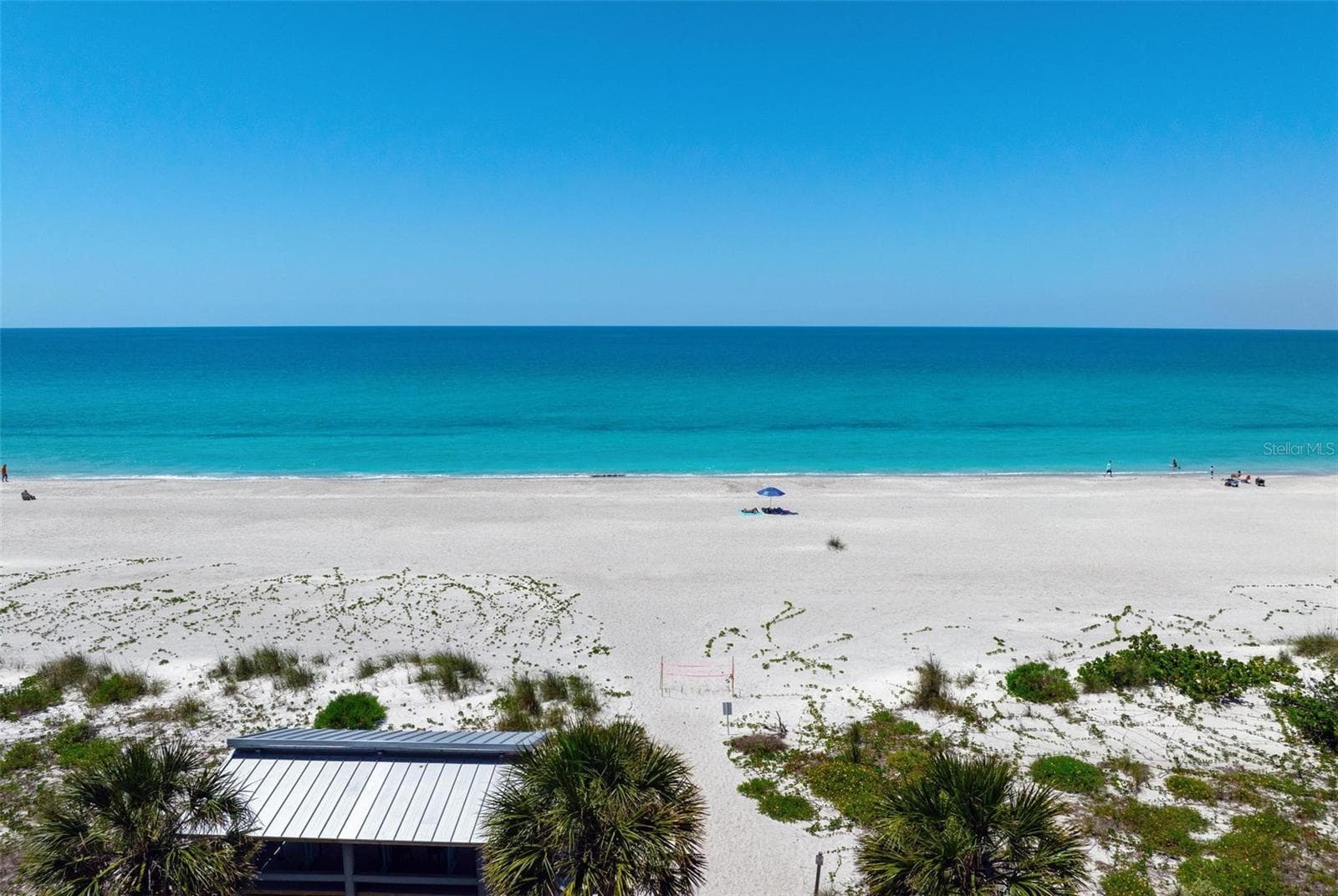 Closer drone view of your private beach. - 581 ROUNTREE DR, LONGBOAT KEY