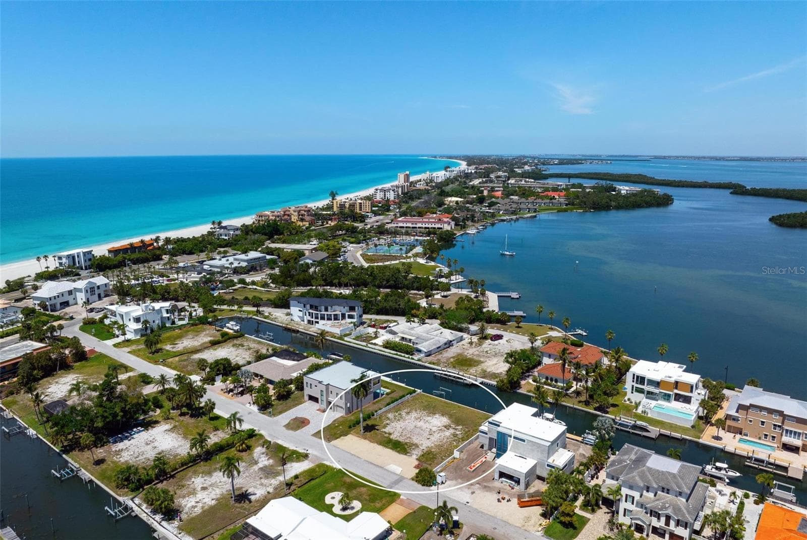 Deep canal front lot looking northwest with Gulf on left and Sarasota Bay on right. Exit to Sarasota Bay by turning right. - 581 ROUNTREE DR, LONGBOAT KEY