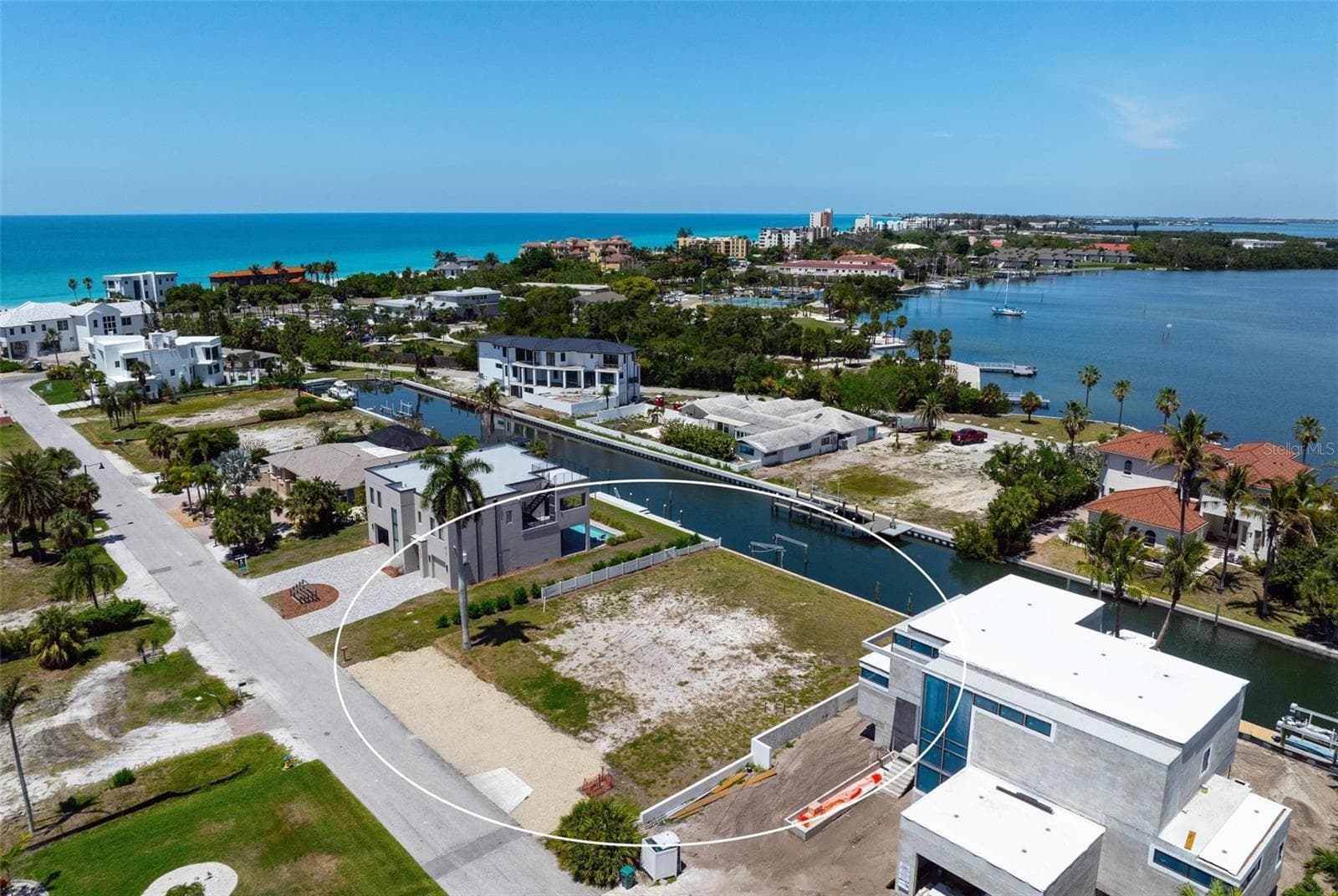Drone view of vacant lot looking northwest. - 581 ROUNTREE DR, LONGBOAT KEY