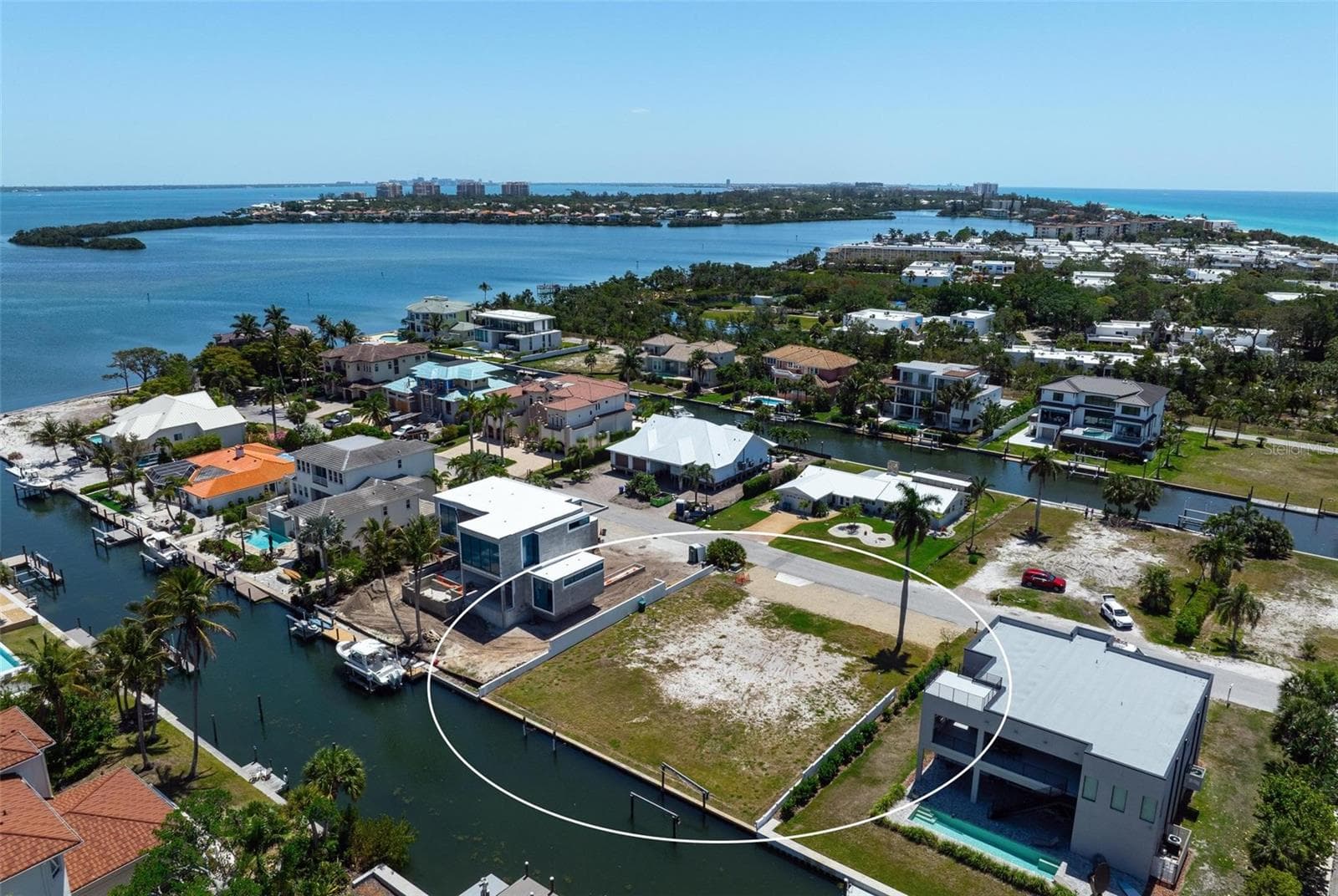 Drone view showing close proximity to entrance to Sarasota Bay at bottom left. - 581 ROUNTREE DR, LONGBOAT KEY