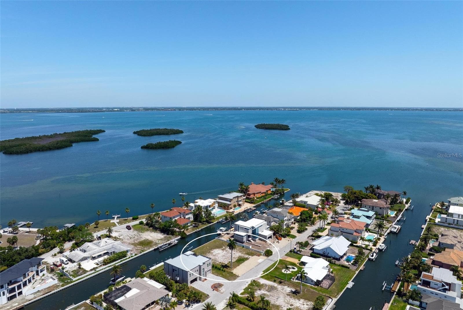 Drone view looking northeast across Sarasota Bay to downtown Sarasota. - 581 ROUNTREE DR, LONGBOAT KEY