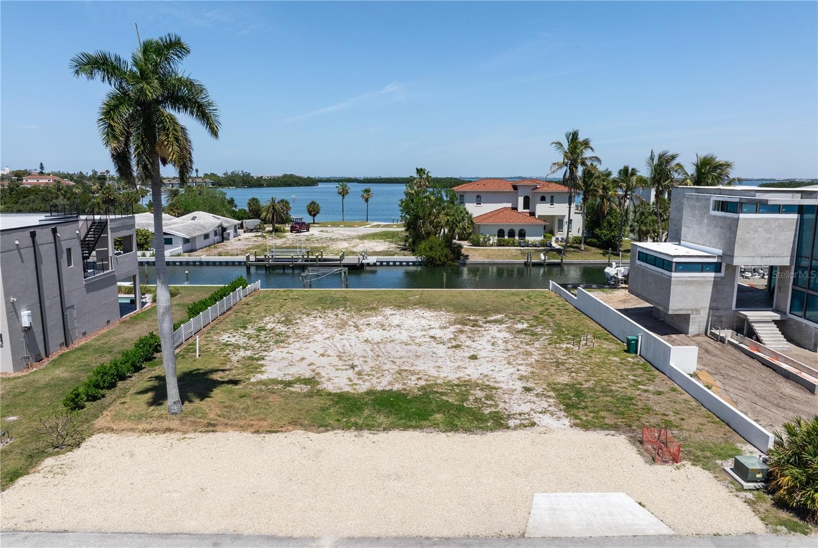 One more reminder of the only deep water canal front vacant lot in all of Longboat Key Estates! - 581 ROUNTREE DR, LONGBOAT KEY