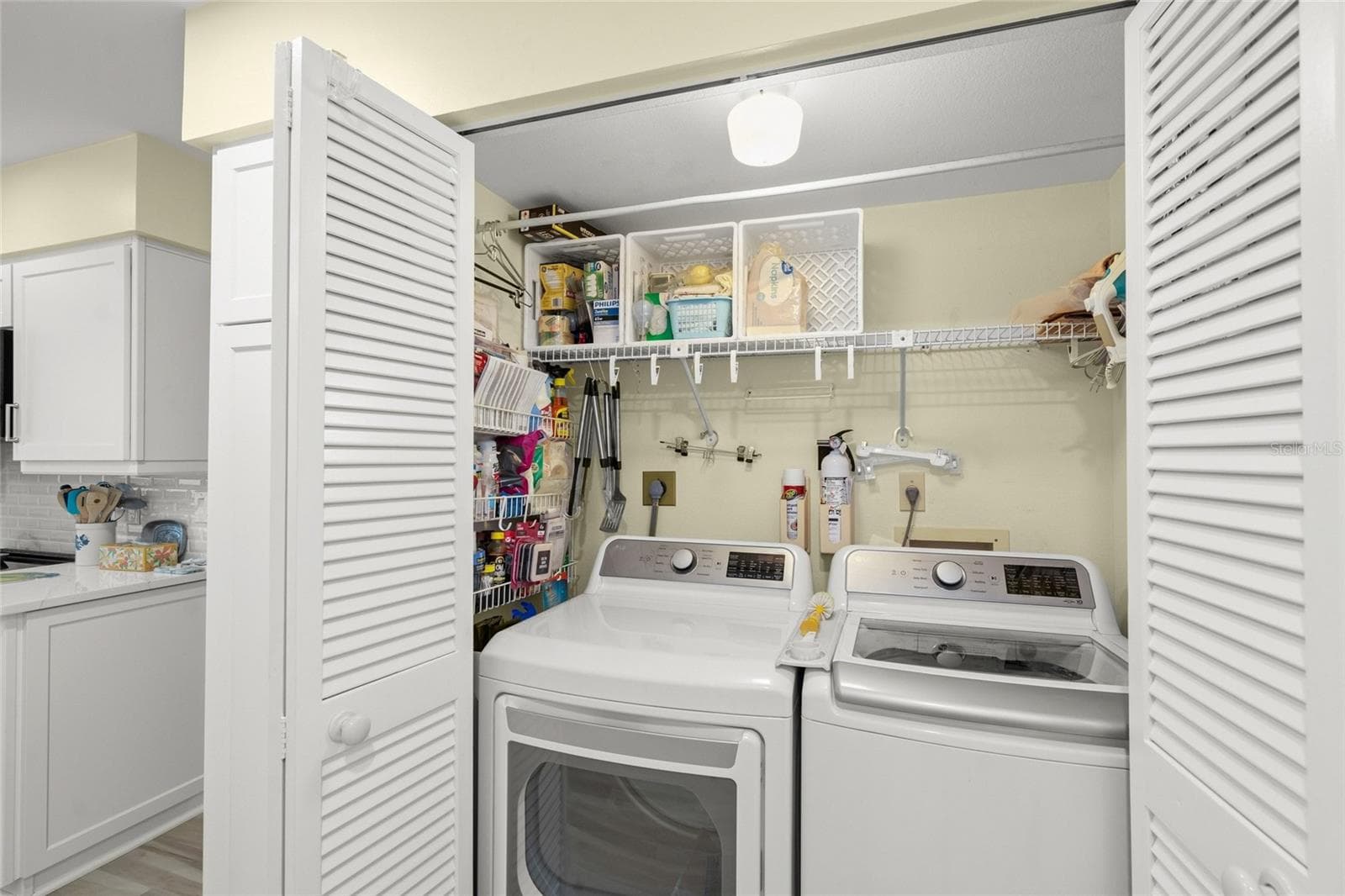 Closet Washer & Dryer in Kitchen Area - 4688 OAK HOLLOW DR #25, SARASOTA