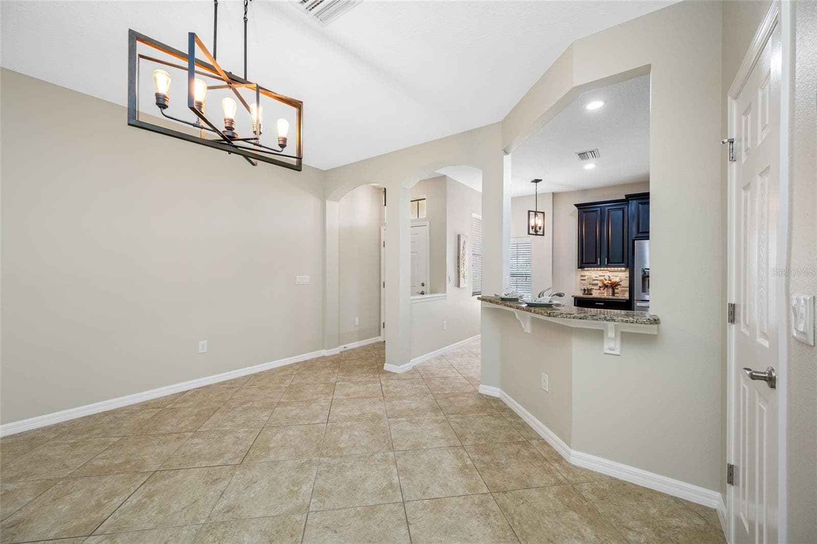 Breakfast Bar from Kitchen to Dining Room! - 2527 SILVERBACK CT, PALM HARBOR