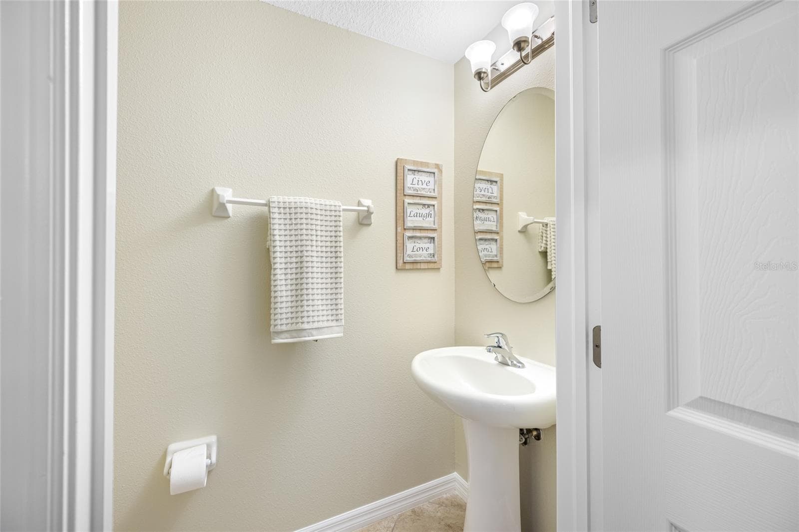 Powder Room downstairs near Great Room! - 2527 SILVERBACK CT, PALM HARBOR