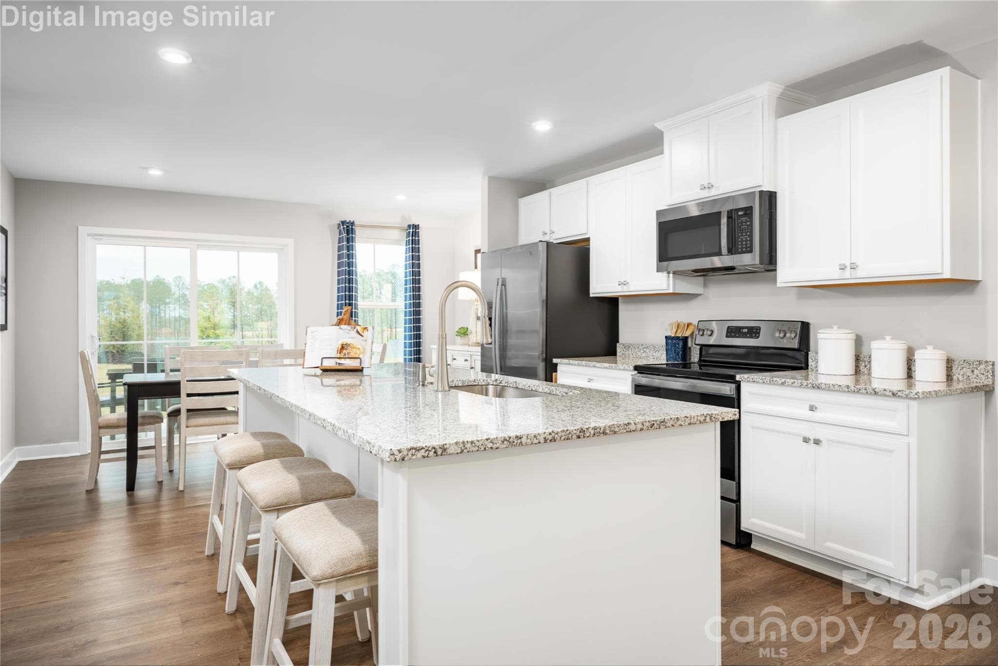 Step into this Kitchen With gleaming granite countertops that offer both durability and style, this space is designed to be the heart of the home. - 3271 Eller Drive Extension, Hickory