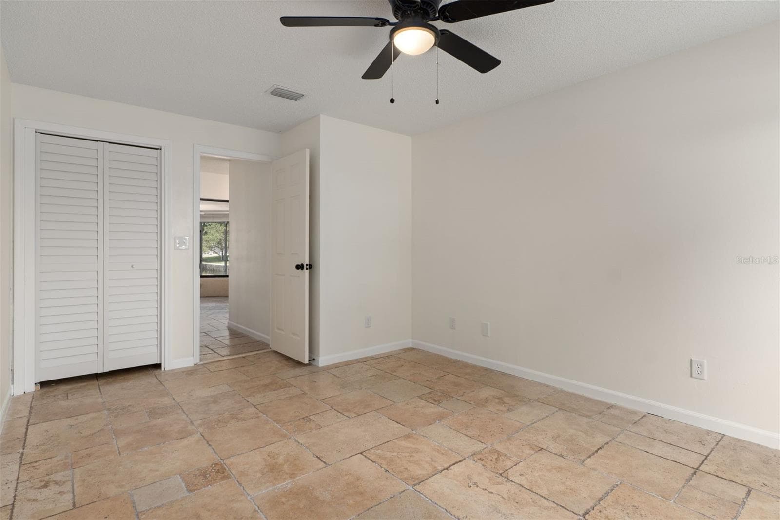 First Bedroom - 239 SE PARADISE POINT RD, CRYSTAL RIVER