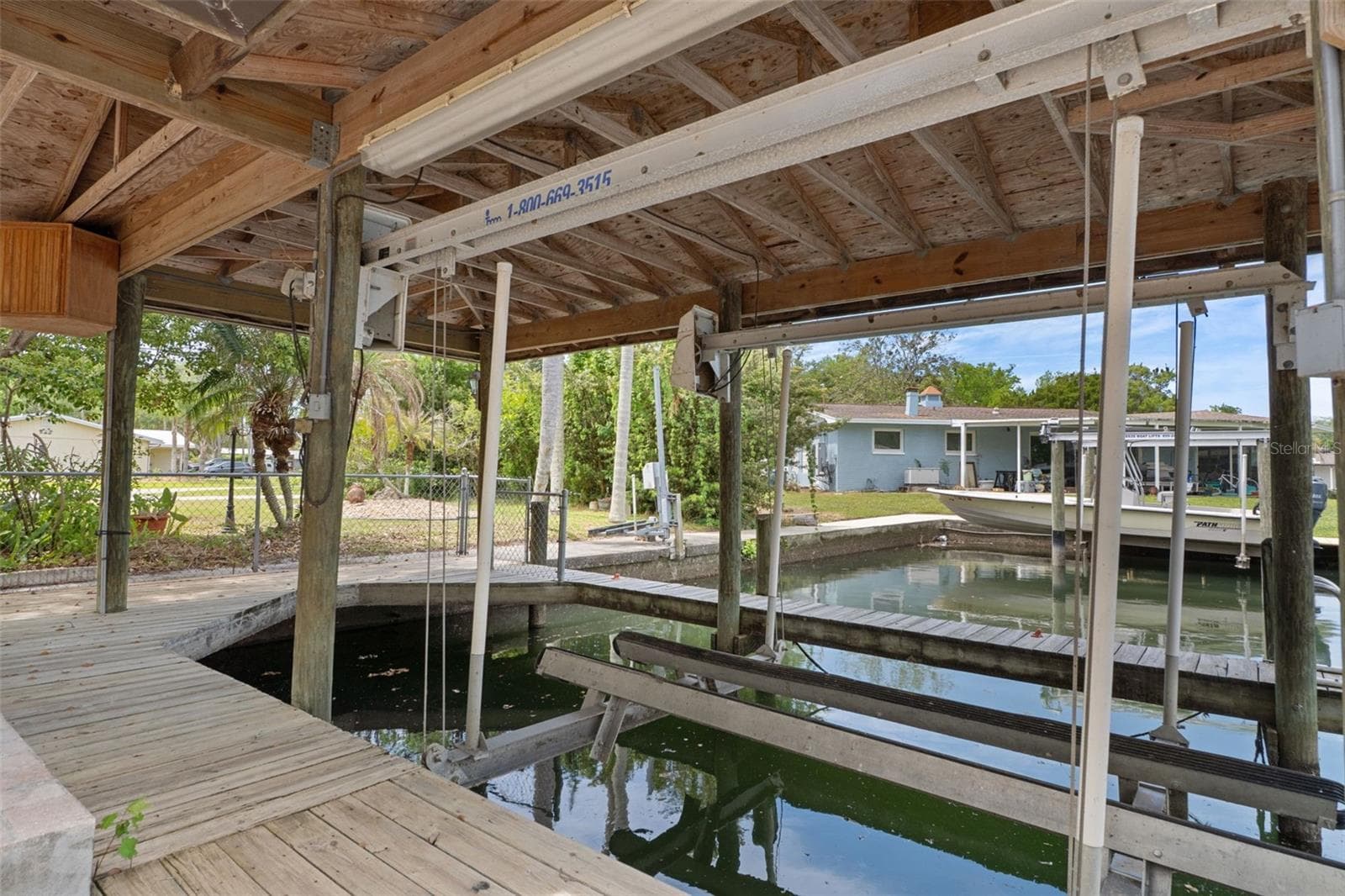 Boathouse and Lift - 239 SE PARADISE POINT RD, CRYSTAL RIVER