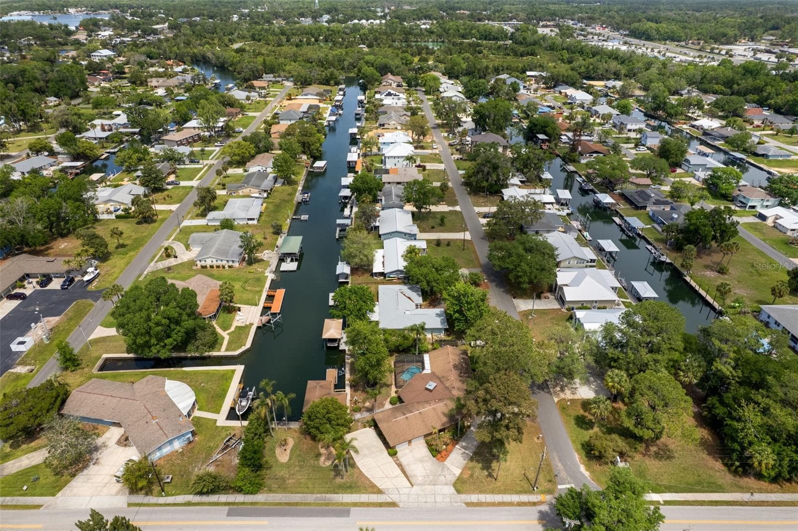 Aerial View with Canal View - 239 SE PARADISE POINT RD, CRYSTAL RIVER