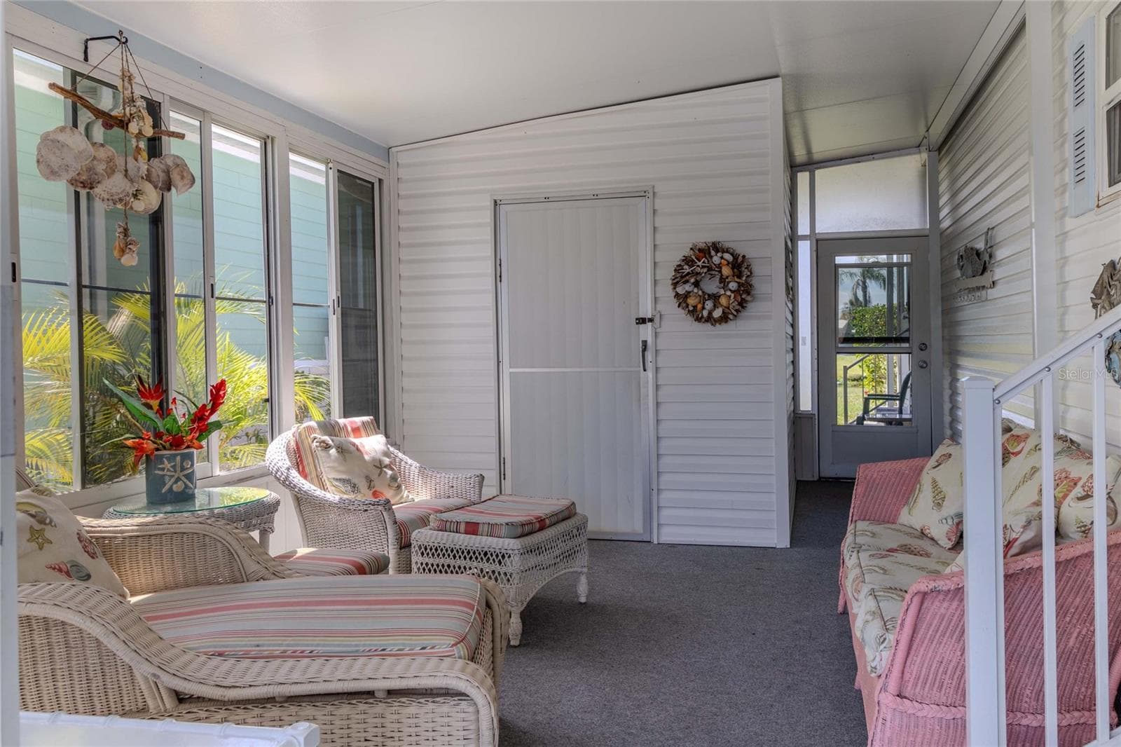 screened enclosed lanai off carport with shed - 2100 KINGS HWY #497, PORT CHARLOTTE