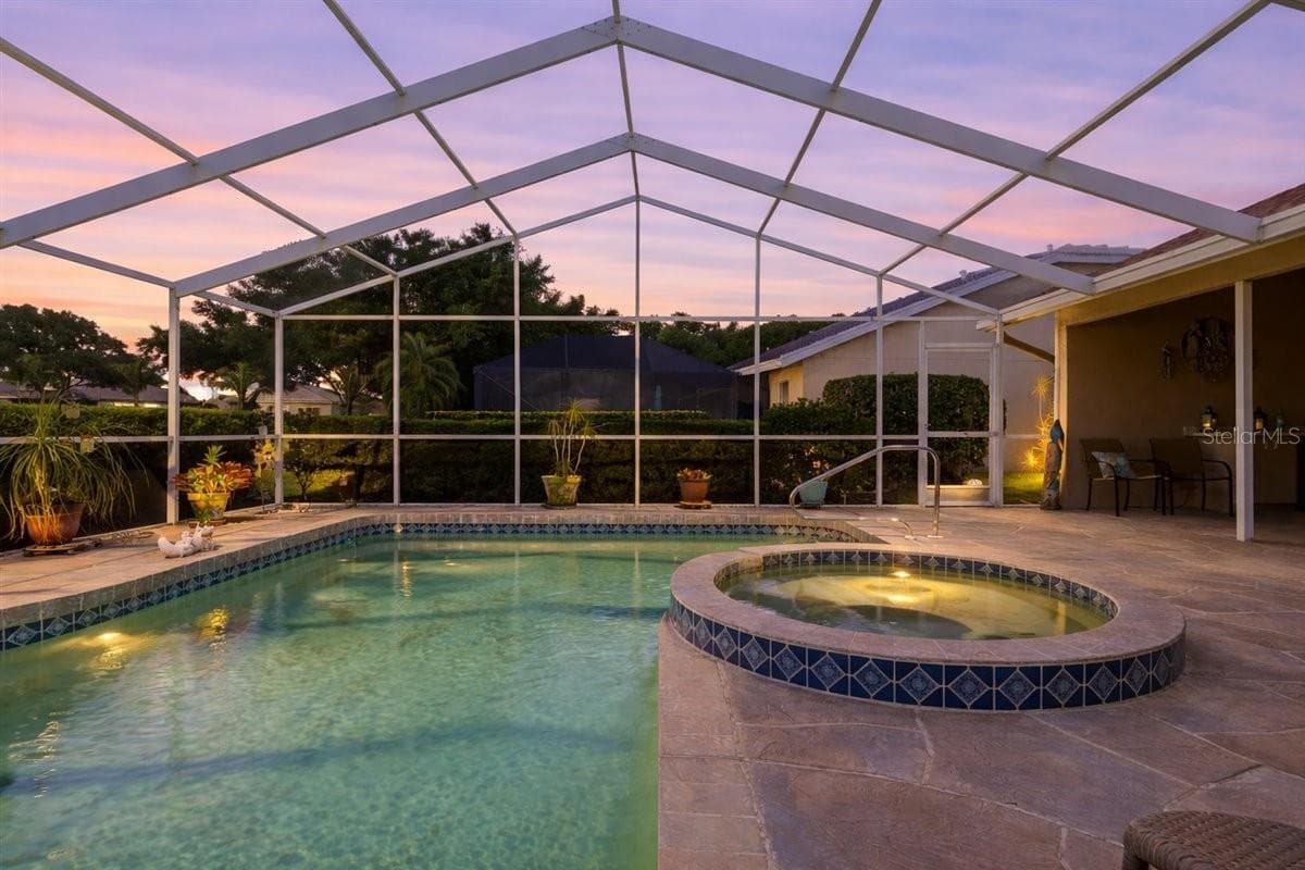 Pool and spa with large under-roof shaded area - 7015 PLEASANT HILL RD, BRADENTON