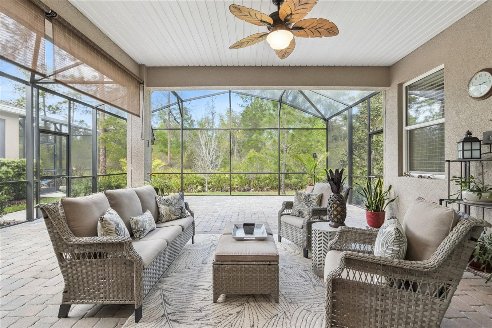 From the lanai, enjoy nature and the peacefulness of the beautiful wooded area behind the  home - 1157 AVERY MEADOWS WAY, DELAND