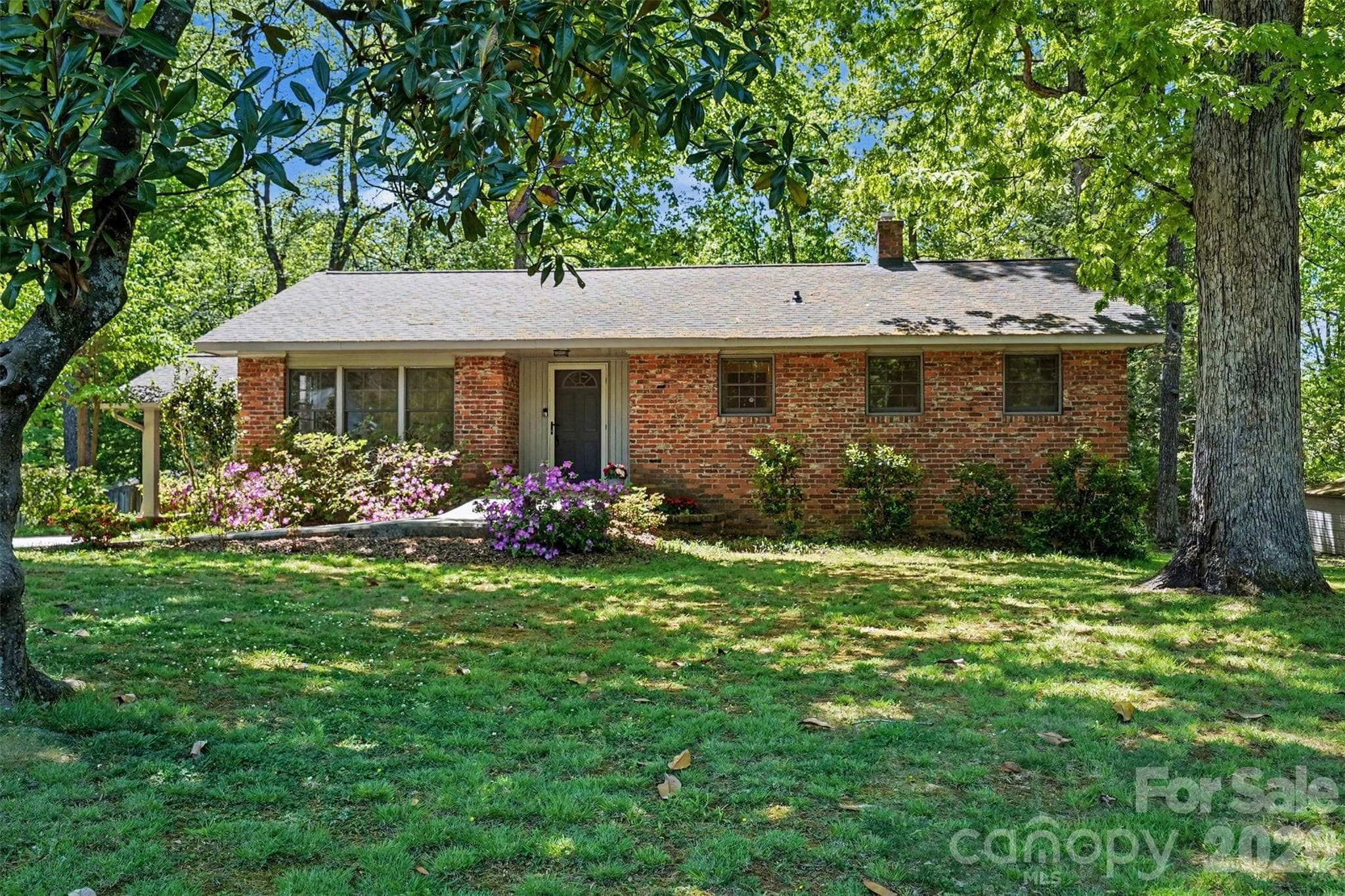 Located in a quiet, desirable Shelby neighborhood, this meticulously maintained brick ranch has 2 bedrooms and 2 full baths. - 804 Phillips Street, Shelby