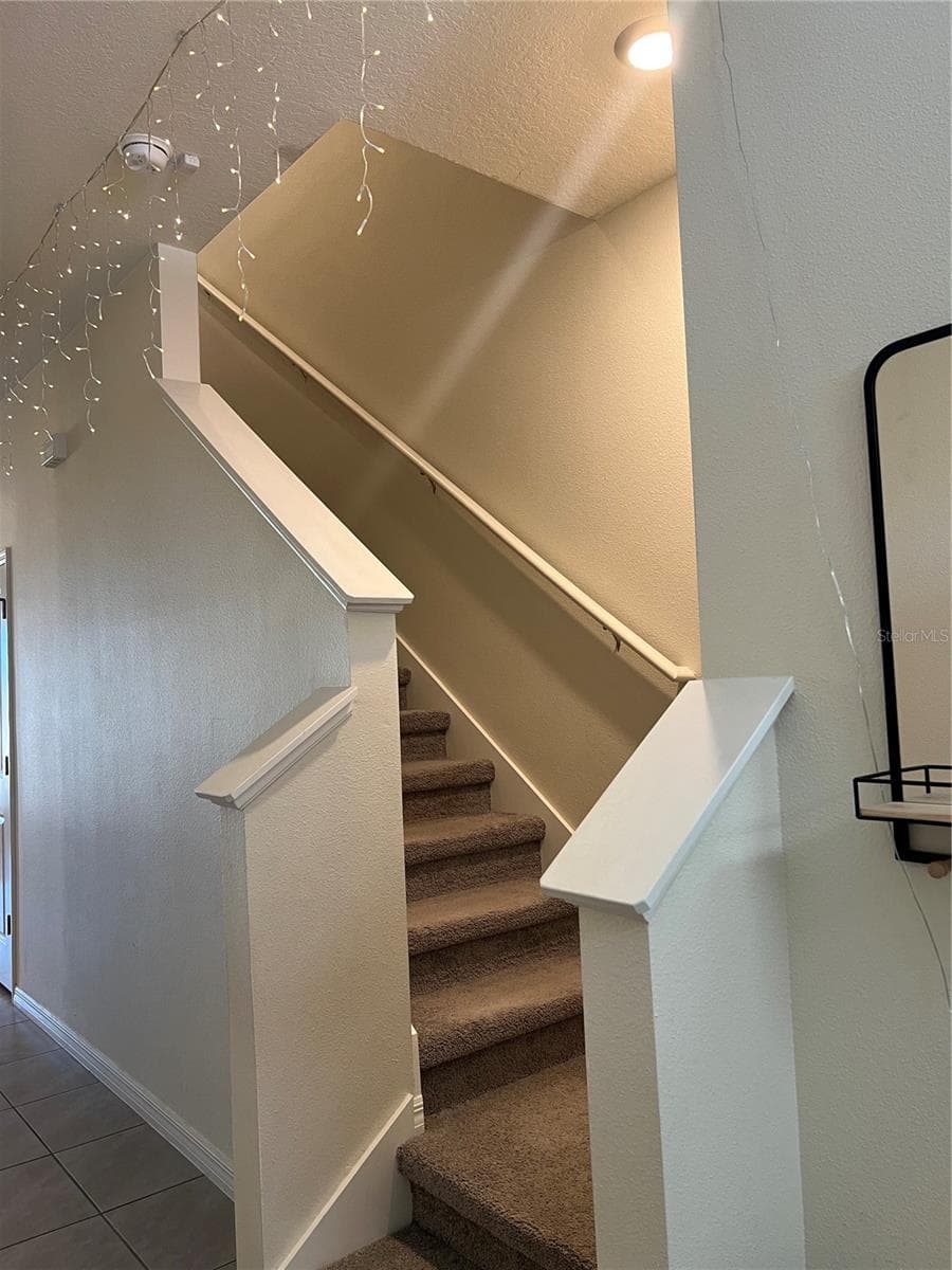Stairway leading to Loft Area and Laundry Closet - 184 MANGROVE SHADE CIR, APOLLO BEACH