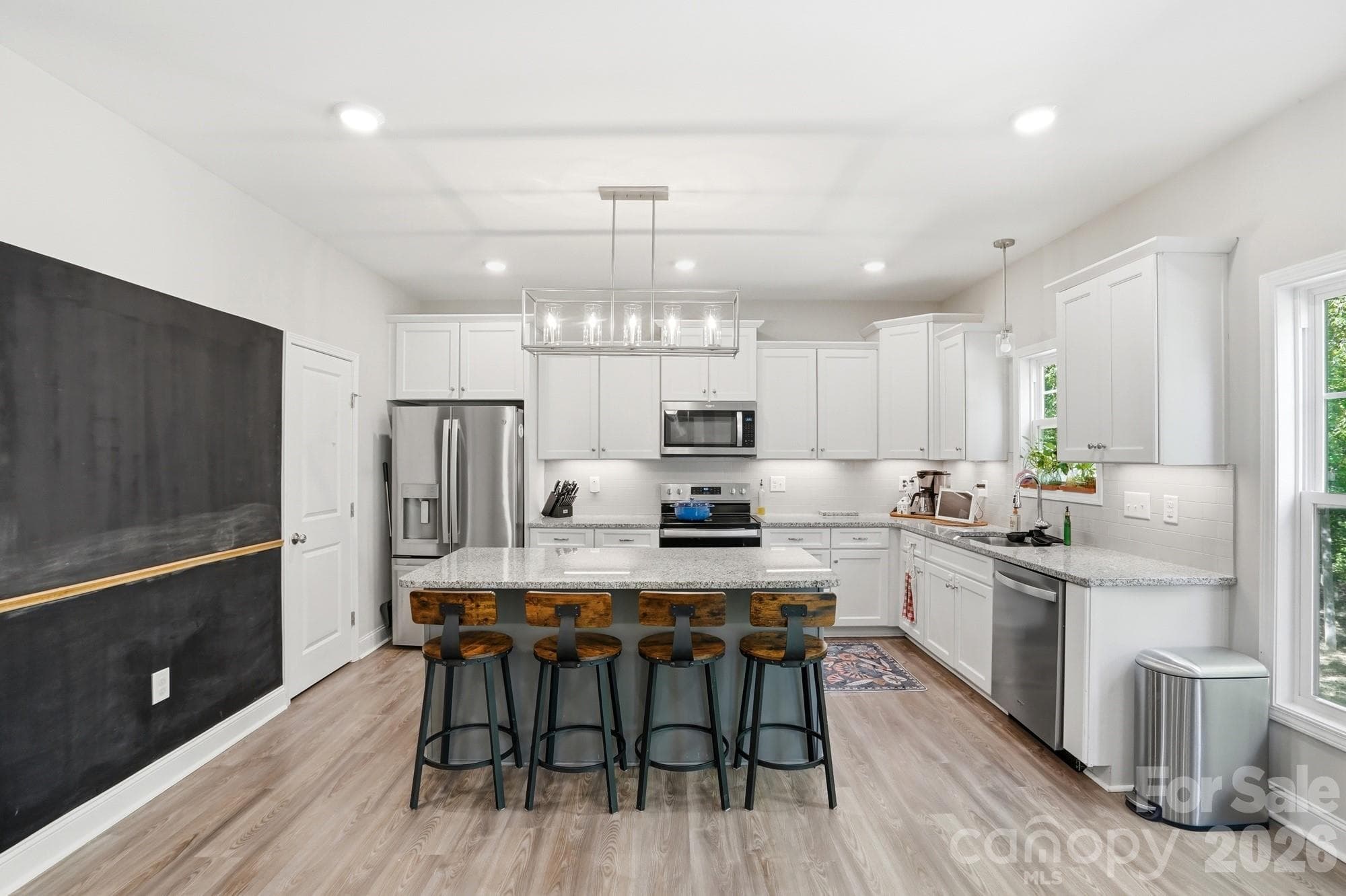 Open kitchen with large island and granite countertops! - Monroe
