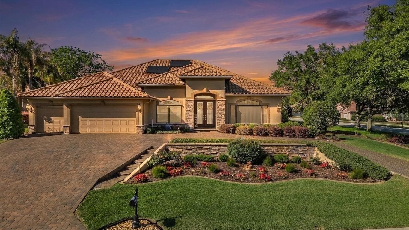 Stone accents enhance the curb appeal! - 34115 AMERICANA AVE, DADE CITY