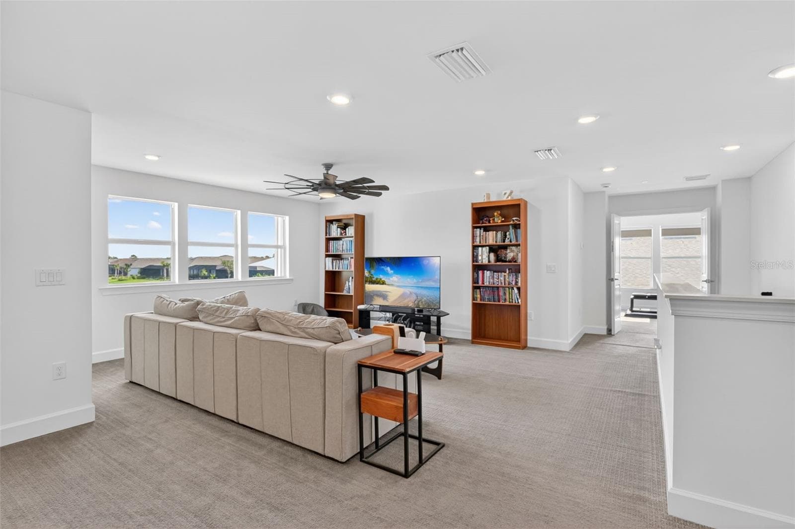 Loft living area with a view - 42581 ATLAS DR, PUNTA GORDA