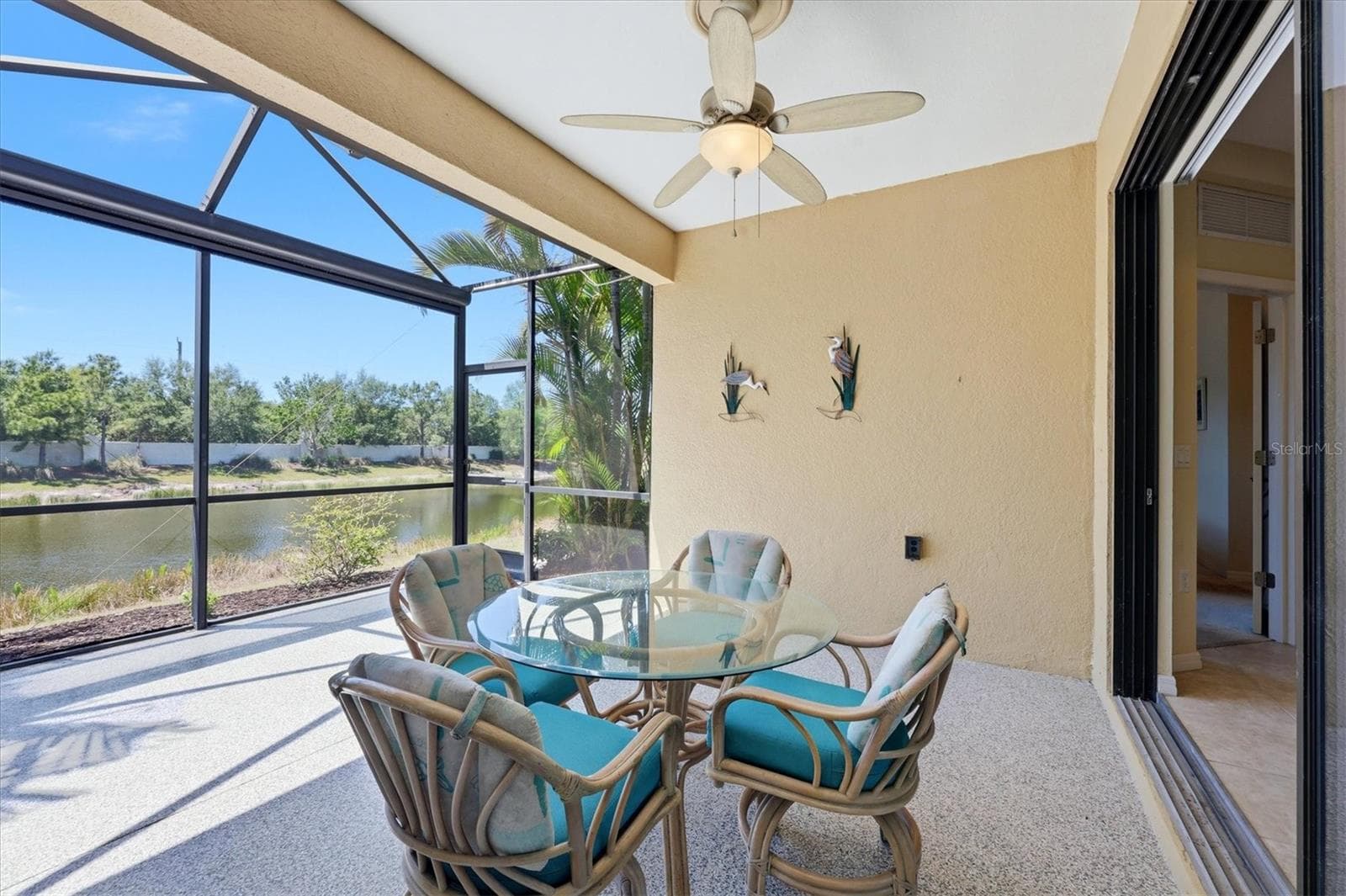 Lanai with lake views - 1359 BACKSPIN DR, ENGLEWOOD