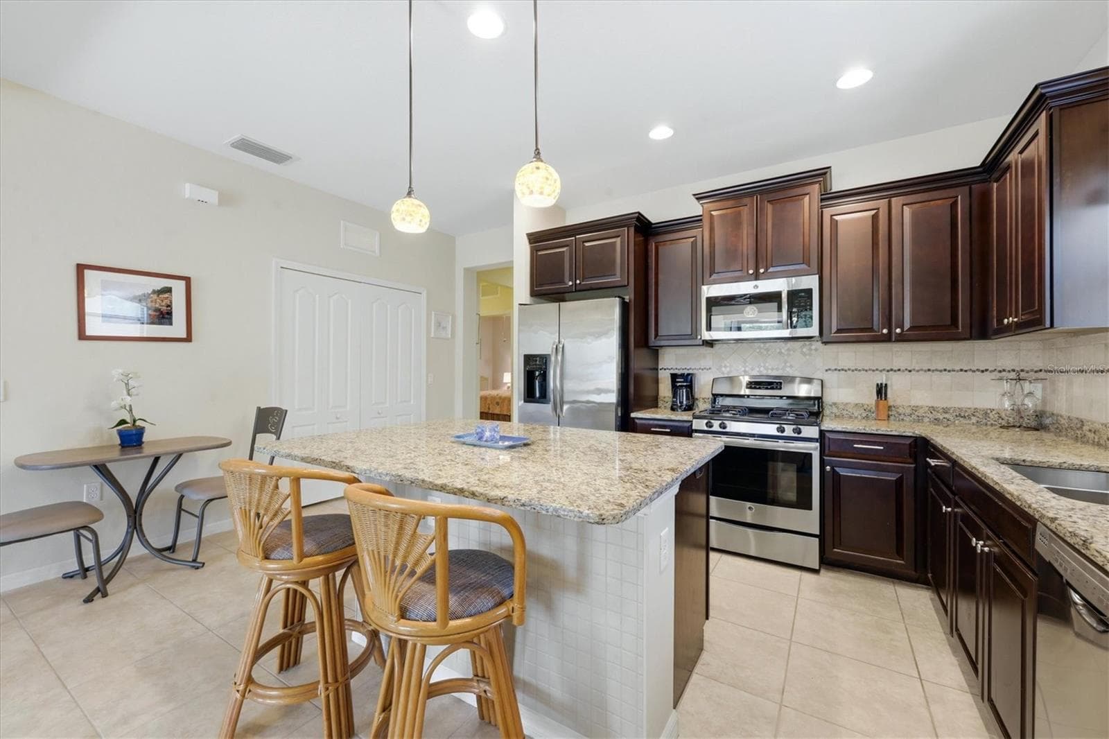 Kitchen features a gas range - 1359 BACKSPIN DR, ENGLEWOOD