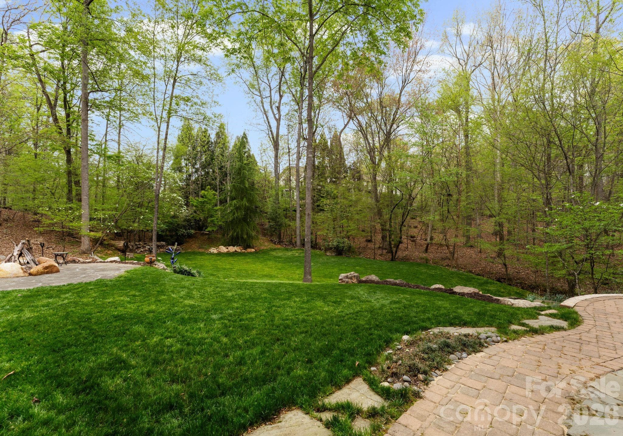 Terraced backyard and surrounded by additional greenspace - 1514 Elmsford Lane, Matthews