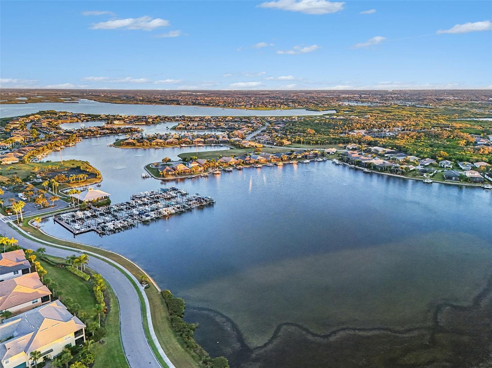 Expansive aerial water view showcasing the surrounding bay, nearby islands, and the exceptional waterfront location. - 1018 OVERLOOK CT, BRADENTON