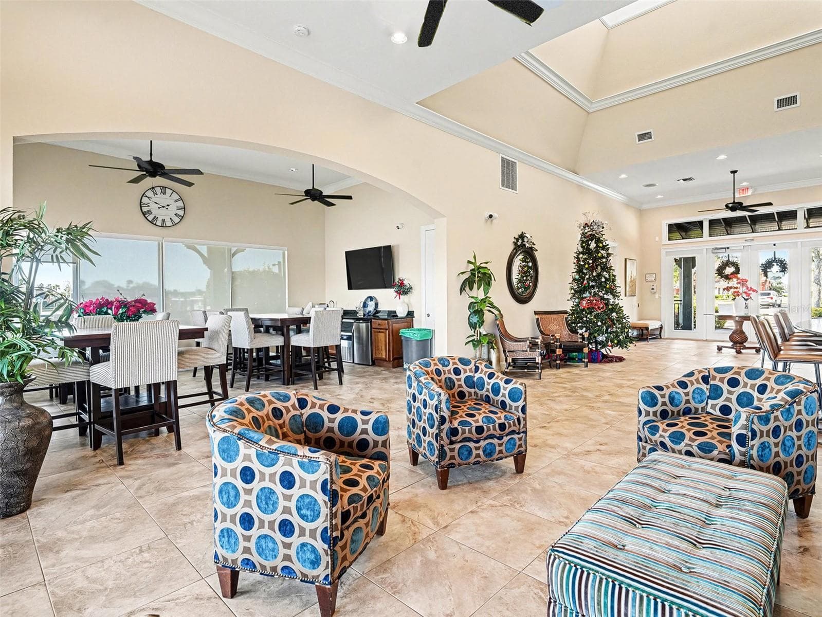 Bright community social space with game tables, lounge seating, and flexible areas for entertainment and events. - 1018 OVERLOOK CT, BRADENTON