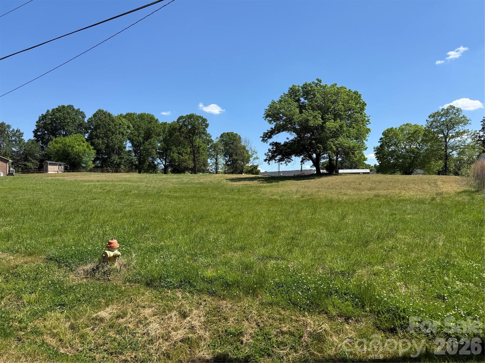 Back Lot Facing Hwy 73 - Concord