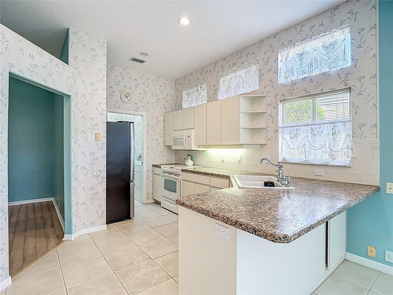 Single Family Residence at 9289 PENELOPE DR, WEEKI WACHEE, photo 7 of 27