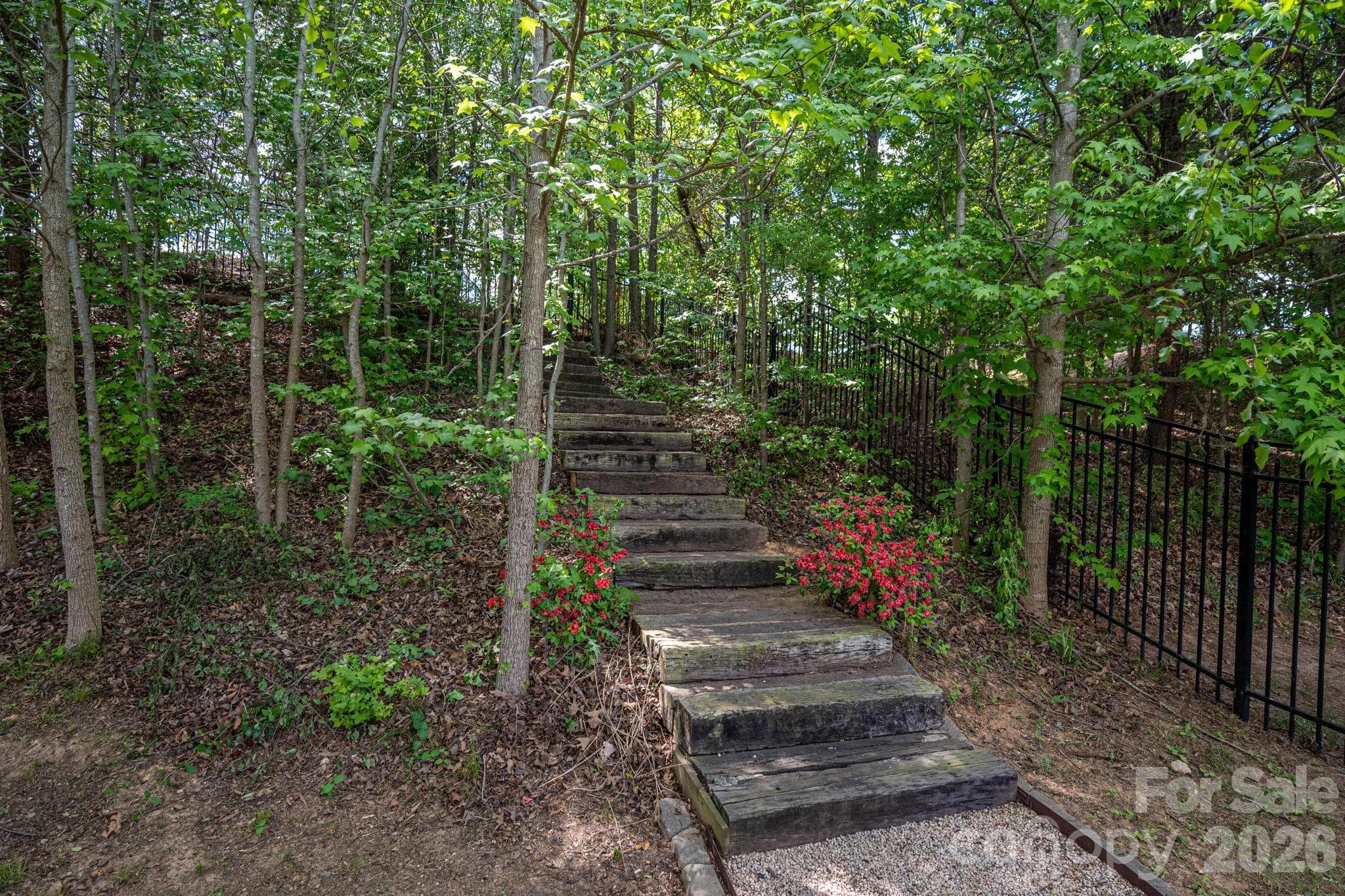 The steps leading to a gate giving access to the beautiful fairway. - 4012 Saint Andrews Court, Cramerton