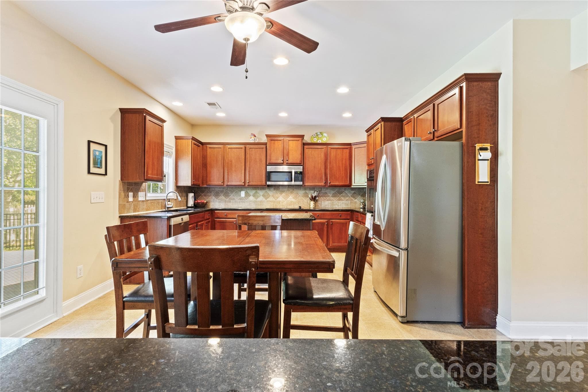 Kitchen with Eat in Breakfast Area. - 8458 Mossy Cup Trail, Harrisburg