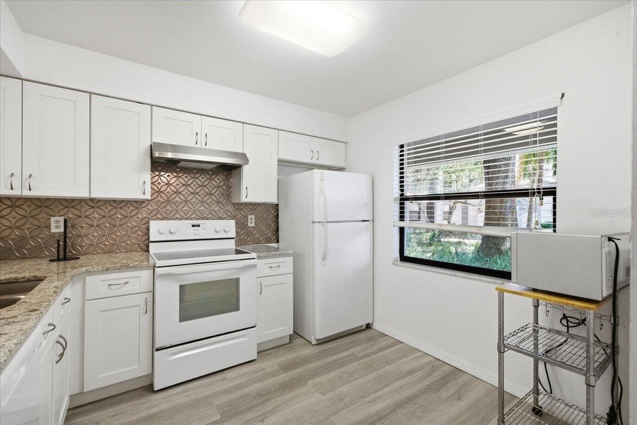 Condominium at 3399 MERMOOR DR #101, PALM HARBOR, photo 6 of 38