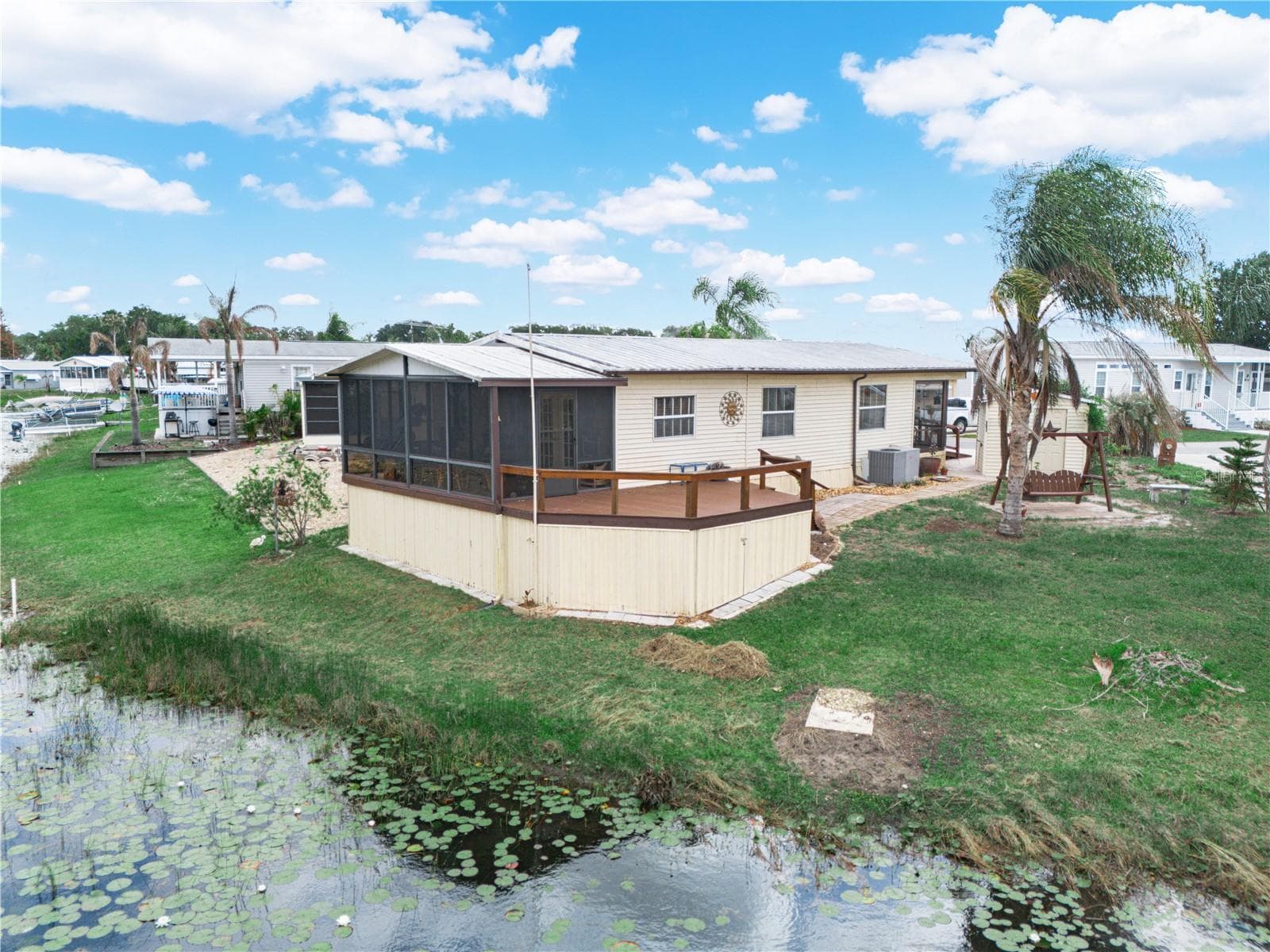 Manufactured Home at 29 BEAVERKILL DR, LAKE WALES, photo 4 of 48