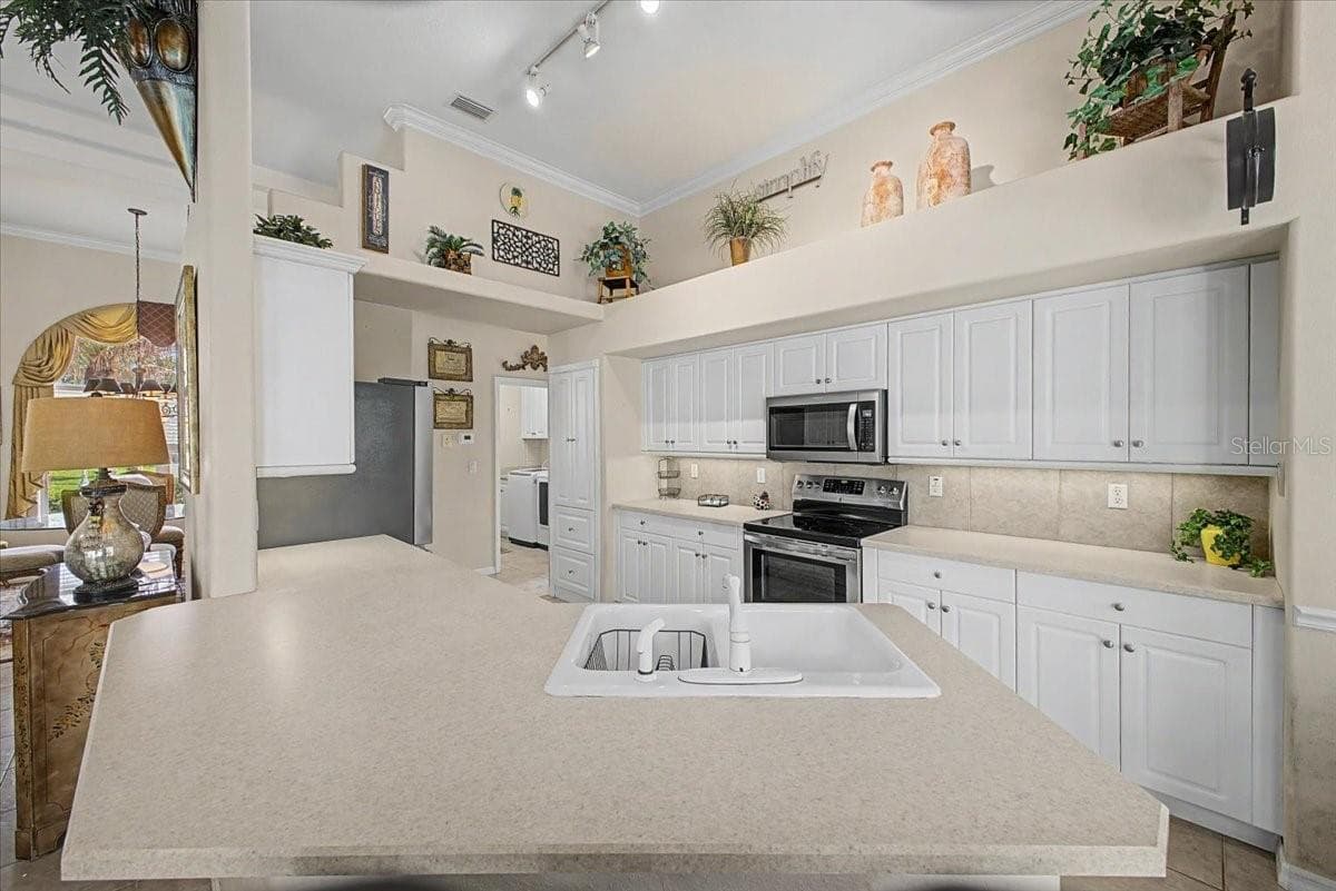 Single Family Residence at 11 CRESCENT LAKE WAY, ORMOND BEACH, photo 11 of 50