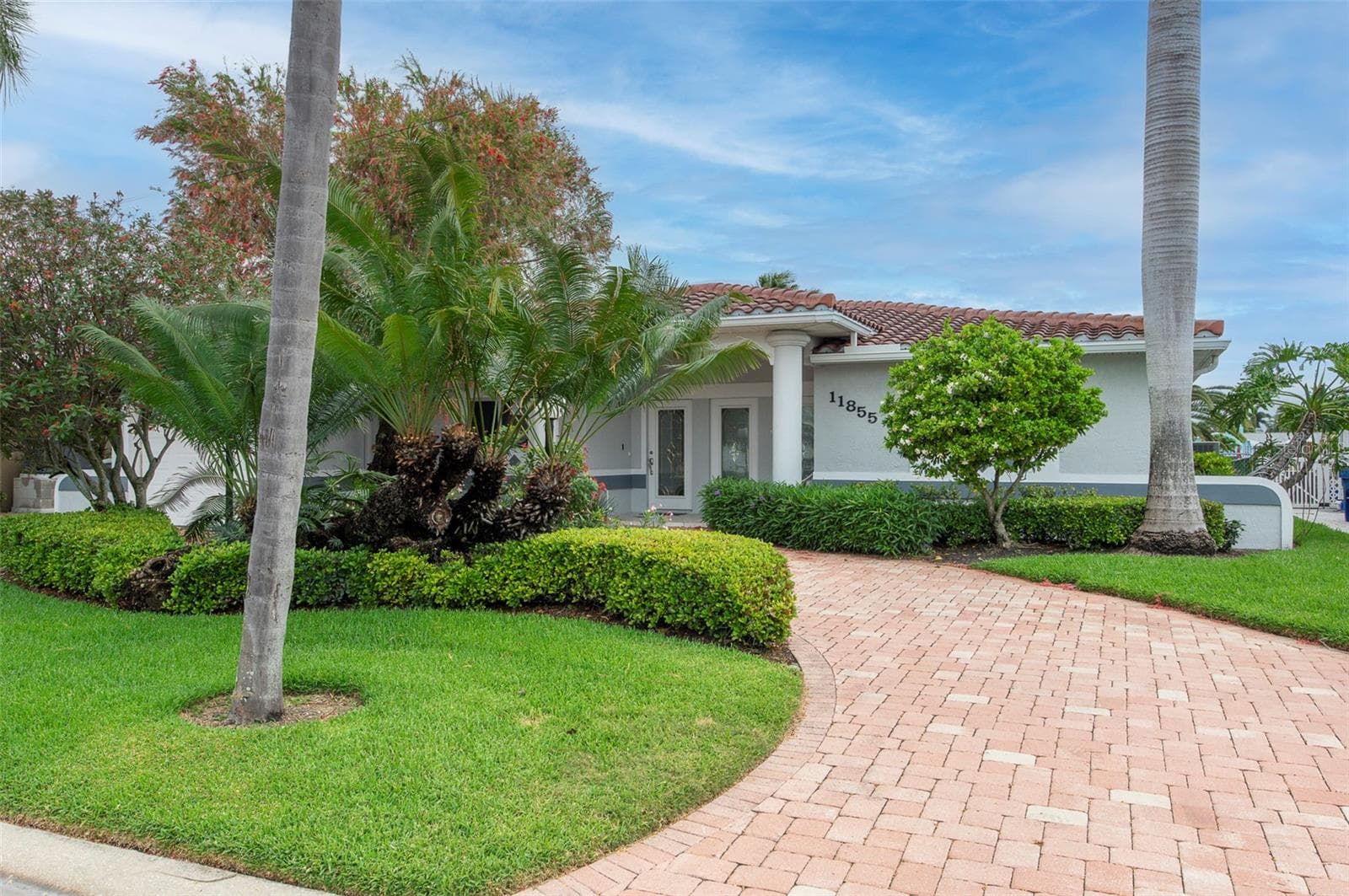 Arrive home on your brick paved circular driveway - 11855 4TH ST E, TREASURE ISLAND