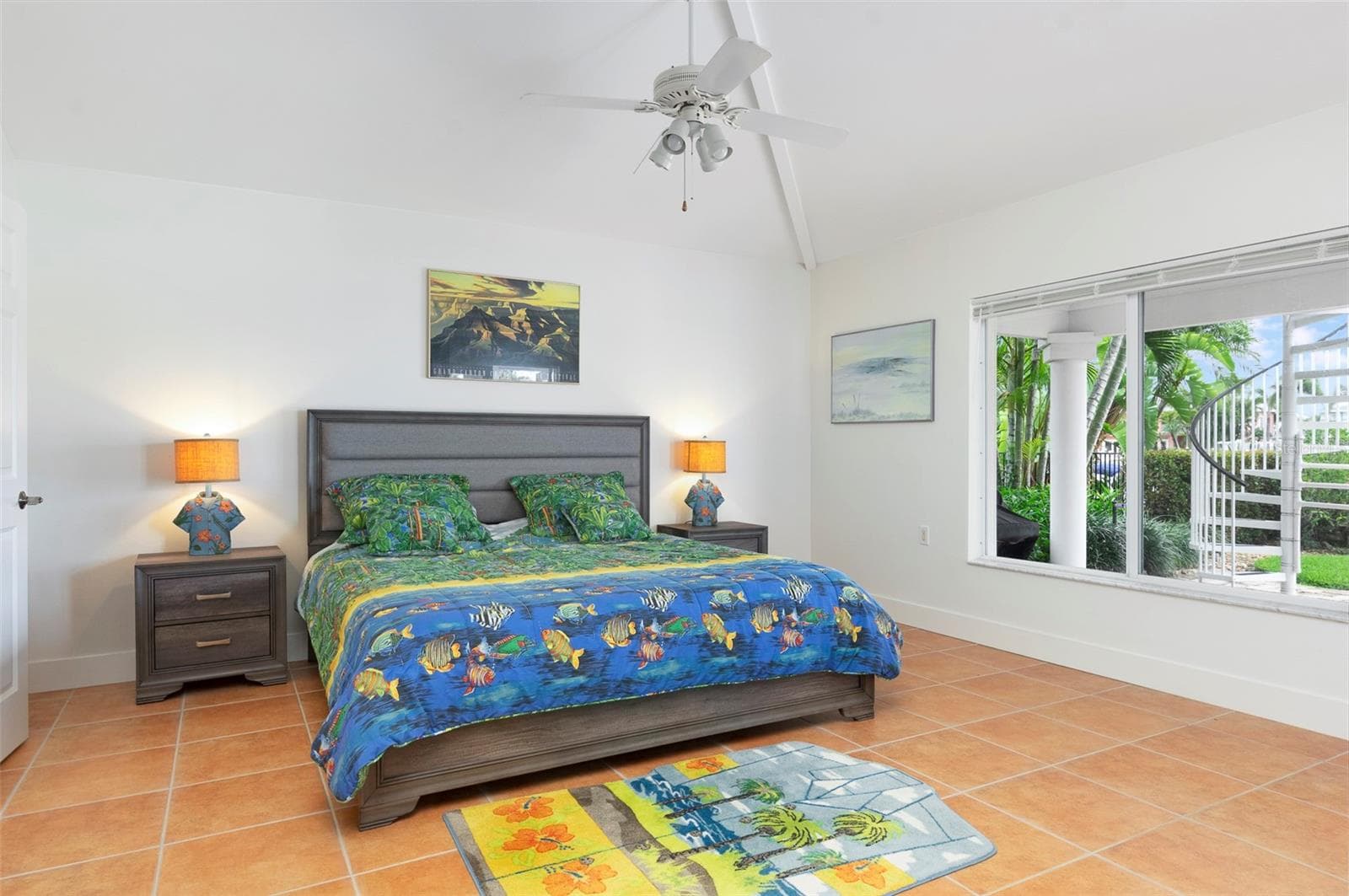 The master bedroom boasts the same spacious tall ceilings & ample natural light - 11855 4TH ST E, TREASURE ISLAND
