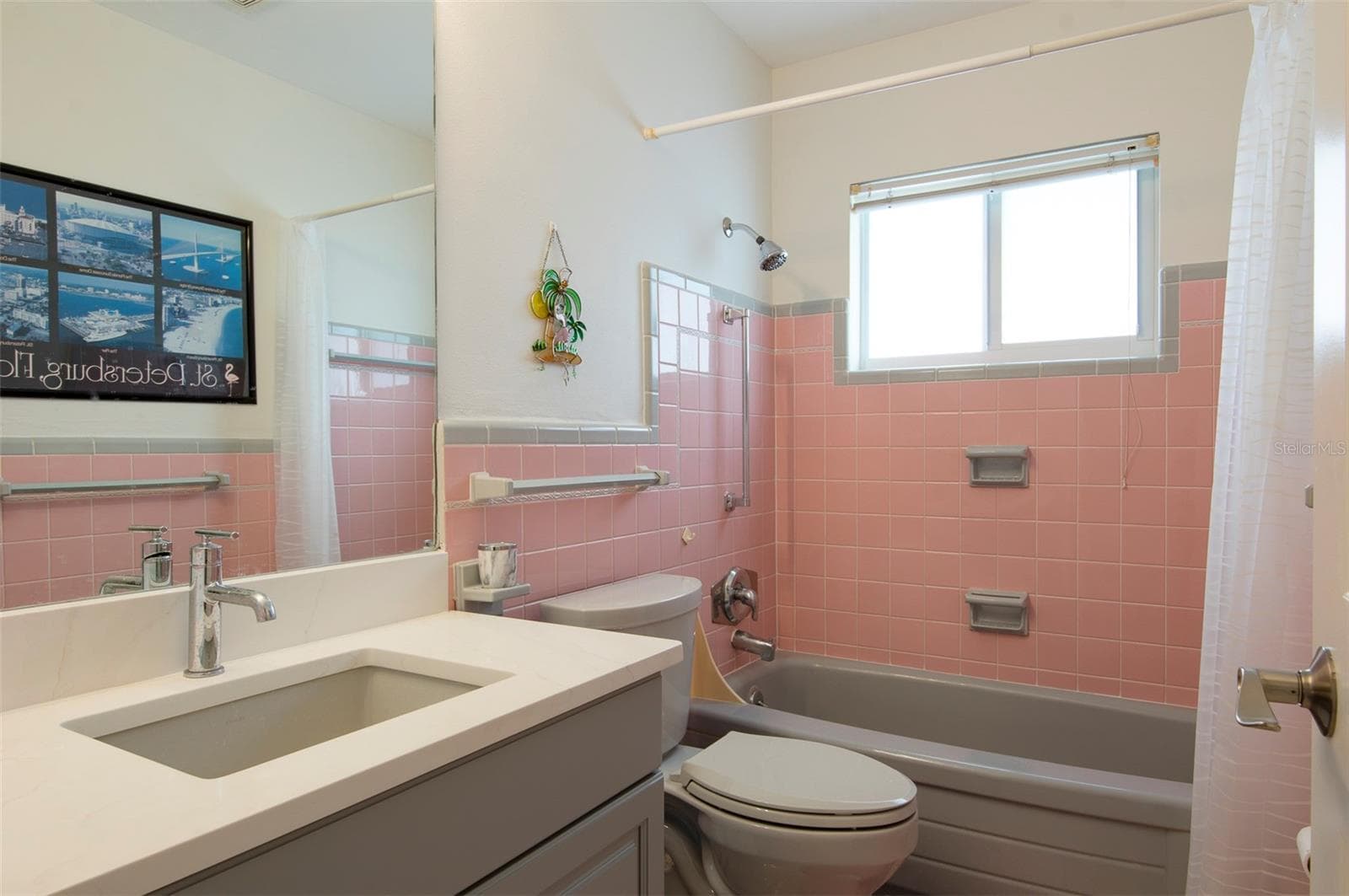 The third bathroom features a tub/shower combo if you're keen to relax in a hot aromatic bath - 11855 4TH ST E, TREASURE ISLAND
