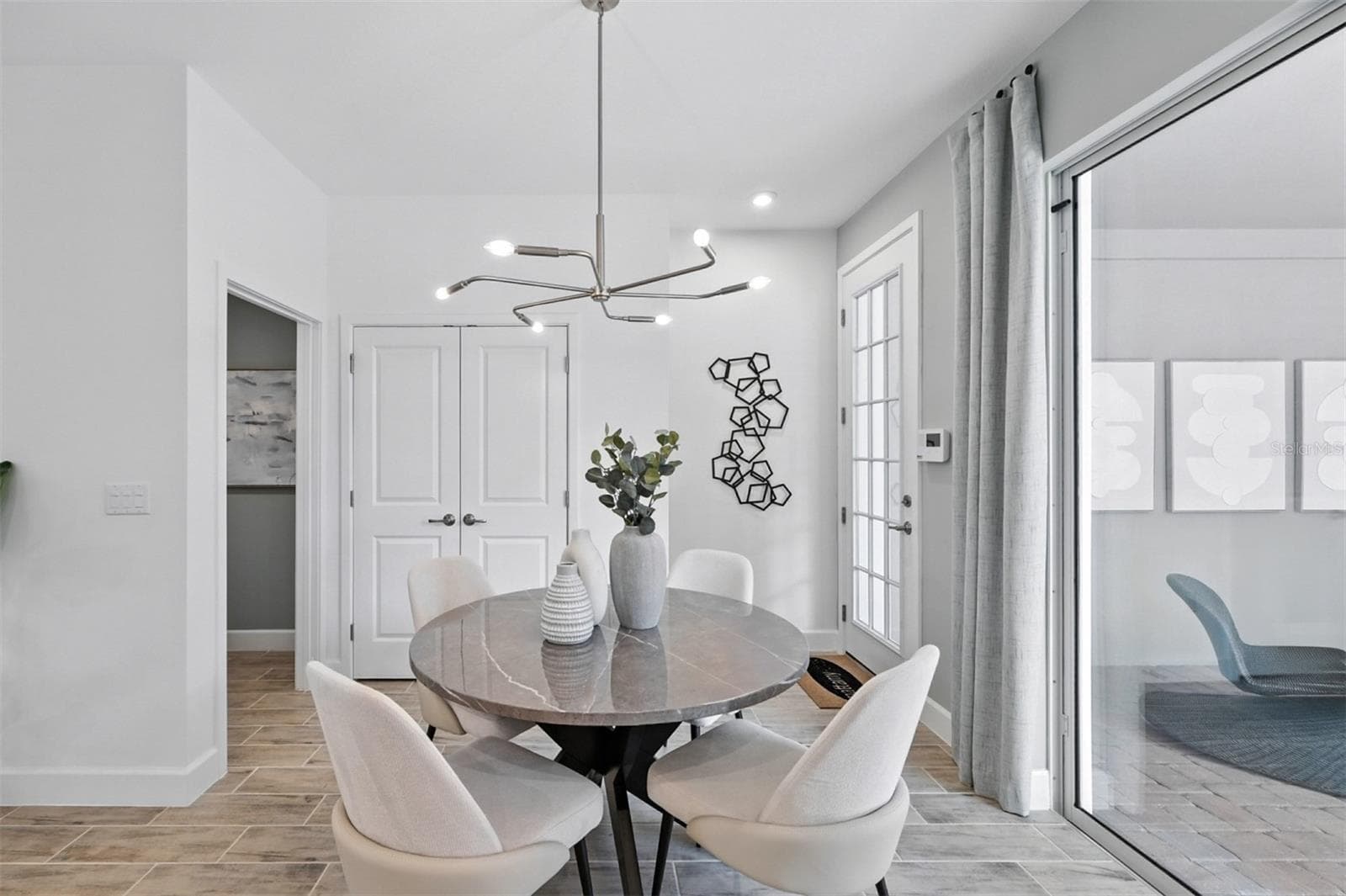 Island Village Amelia Model Dining Room - 1792 HEADLAND LOOP, CELEBRATION
