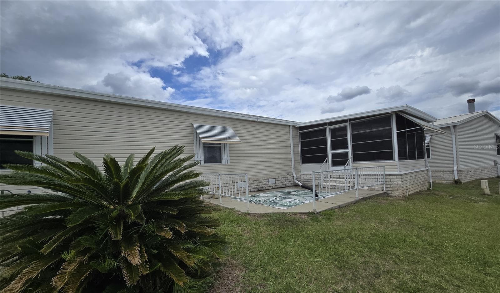 rear lanai - 4122 GREENBLUFF RD #821, ZELLWOOD