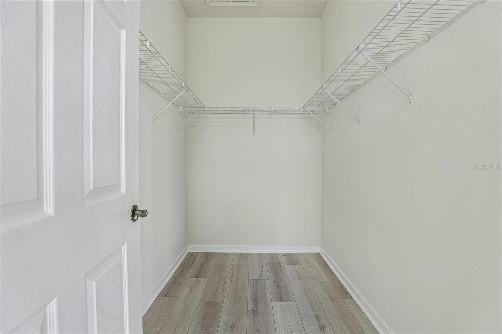 Primary walk in closet - 2315 UPPER PARK RD #302, ORLANDO