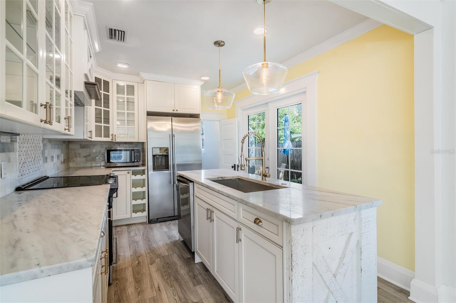 Sellers put in French doors for easy access to the side and back yard - 4109 N SEMINOLE AVE, TAMPA