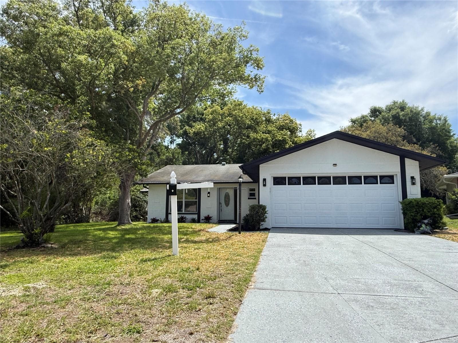 Single Family Residence at 10501 HARDWOOD CT, PORT RICHEY, photo 2 of 58