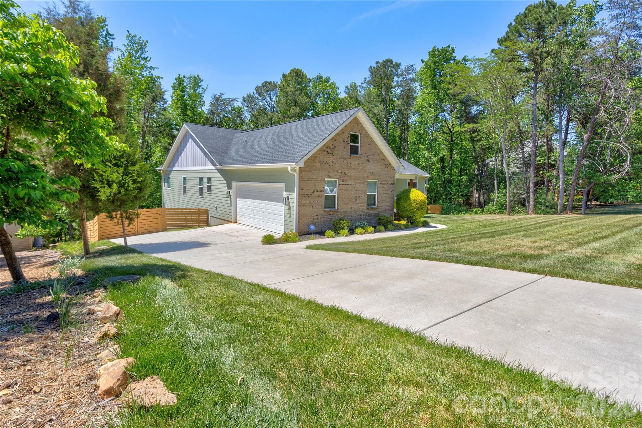Side of home and driveway - Charlotte