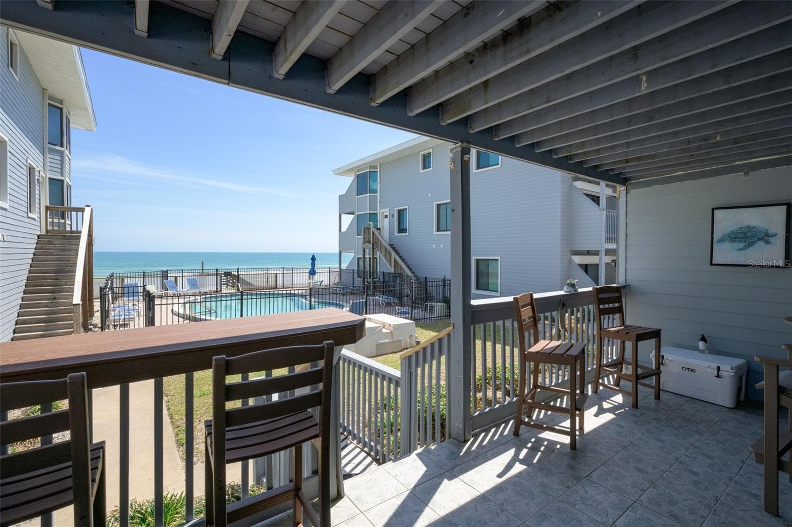 This deck offers wonderful views of the pool and ocean! - 4421 S ATLANTIC AVE #A2, PONCE INLET