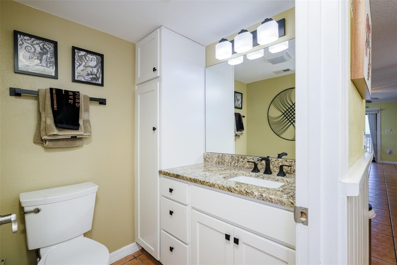 1/2 bath on main floor beside the kitchen - 4421 S ATLANTIC AVE #A2, PONCE INLET