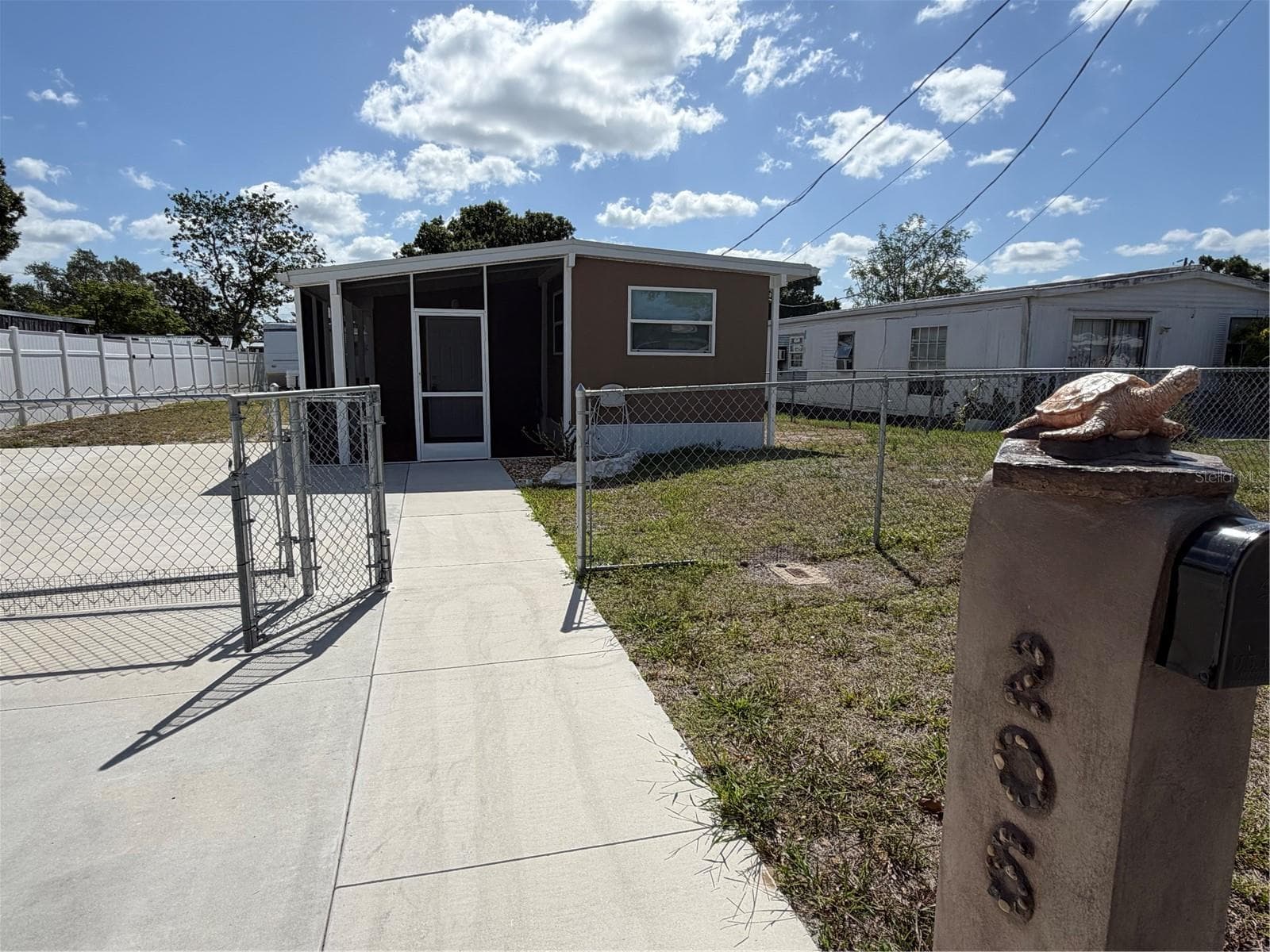 Manufactured Home at 206 RAVENNA ST N, NOKOMIS, photo 2 of 26