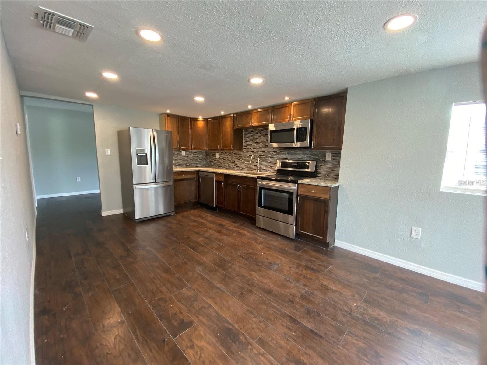 Single Family Residence at 306 PALMETTO AVE NW, WINTER HAVEN, photo 5 of 14