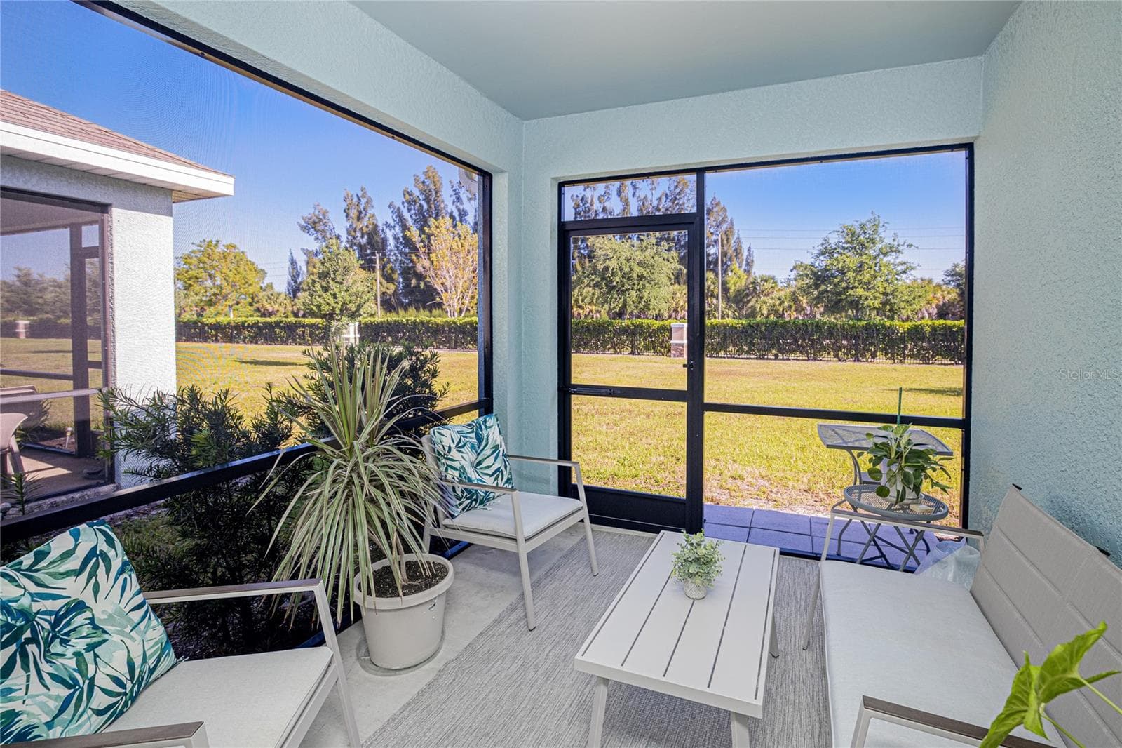 SCREENED-IN COVERED LANAI - 25292 E LENOX CIR, PUNTA GORDA