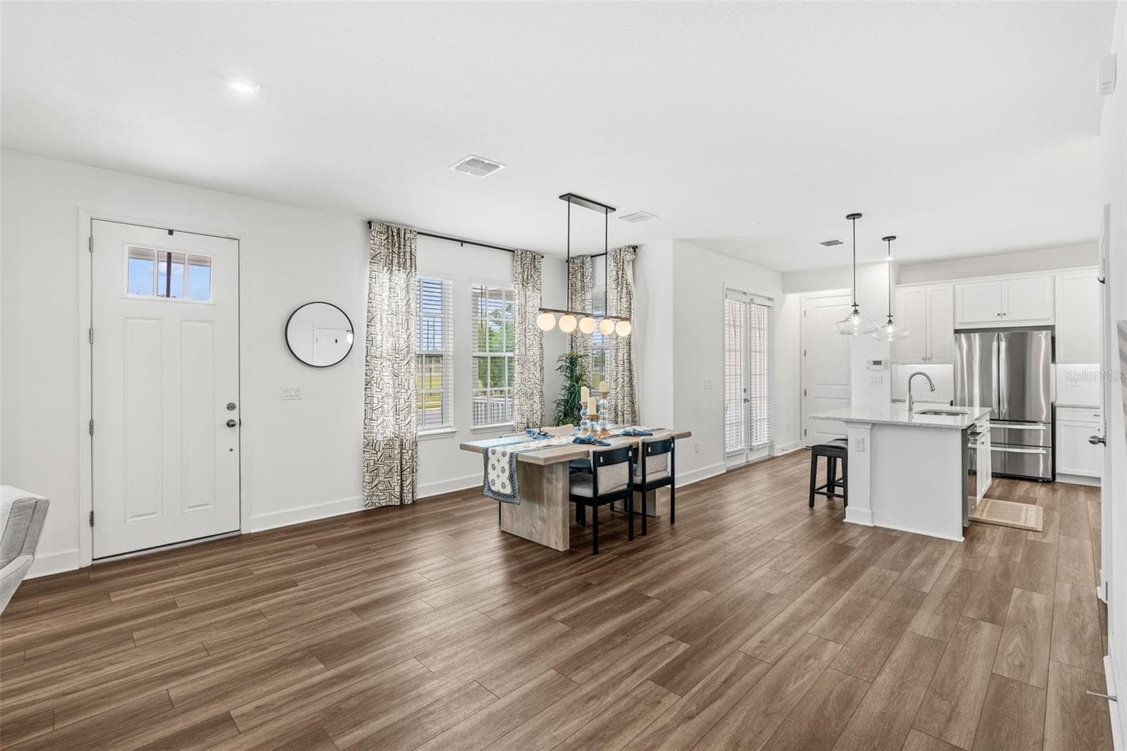 Open concept Dining and Kitchen views - 1851 COASTAL CT, CELEBRATION