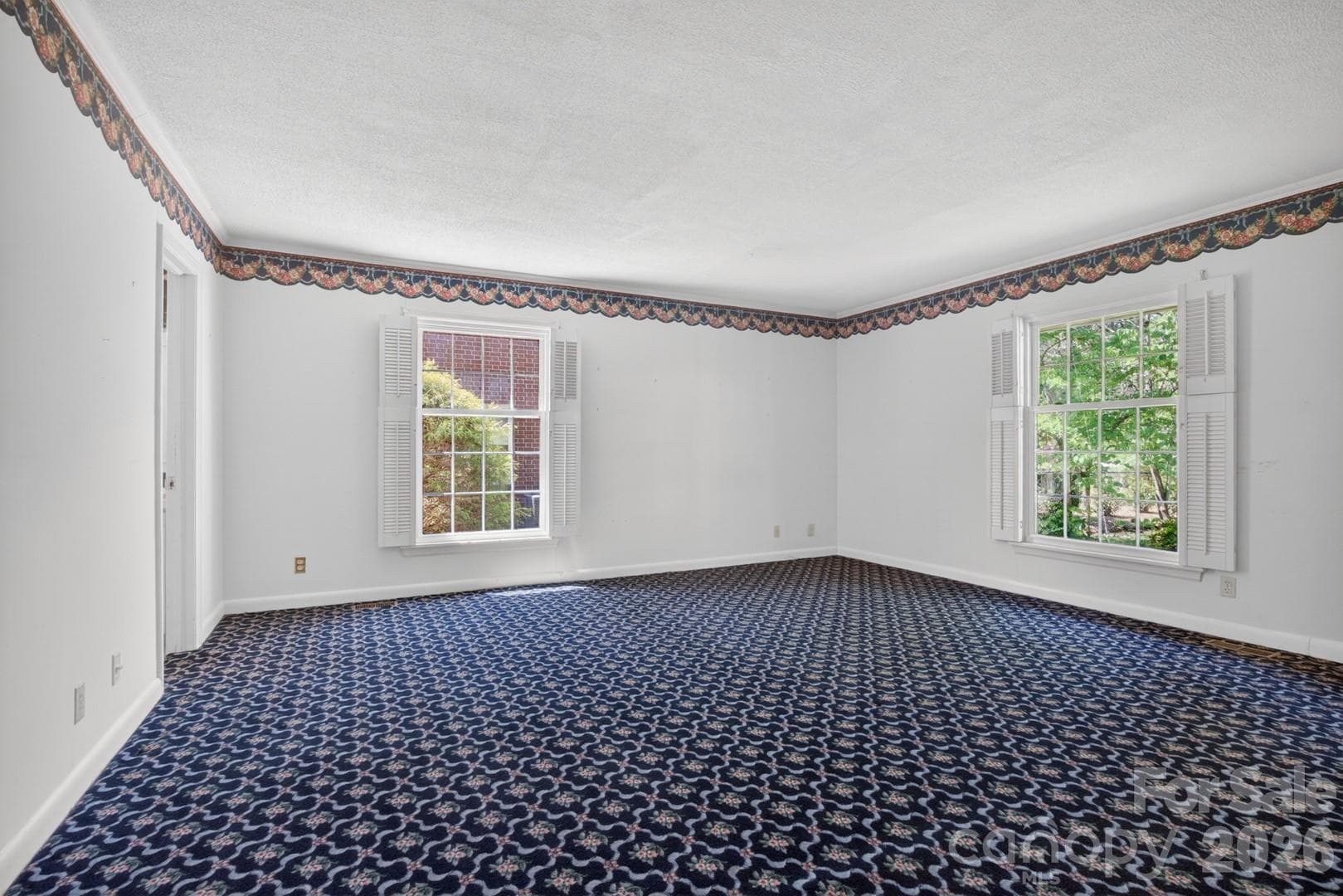 Primary Bedroom - hardwood floors under carpet - Salisbury