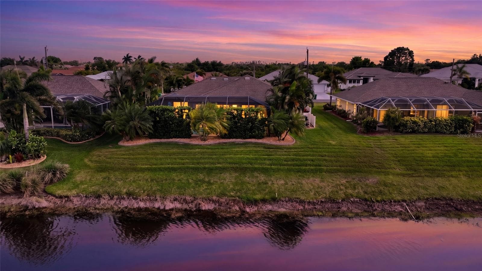 Virtually Enhanced to showcase exterior landscape lightingVirtually Enhanced to showcase exterior landscape lighting - 39 MEDALIST RD, ROTONDA WEST